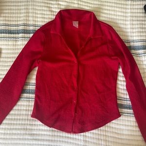 Red long sleeve button up shirt